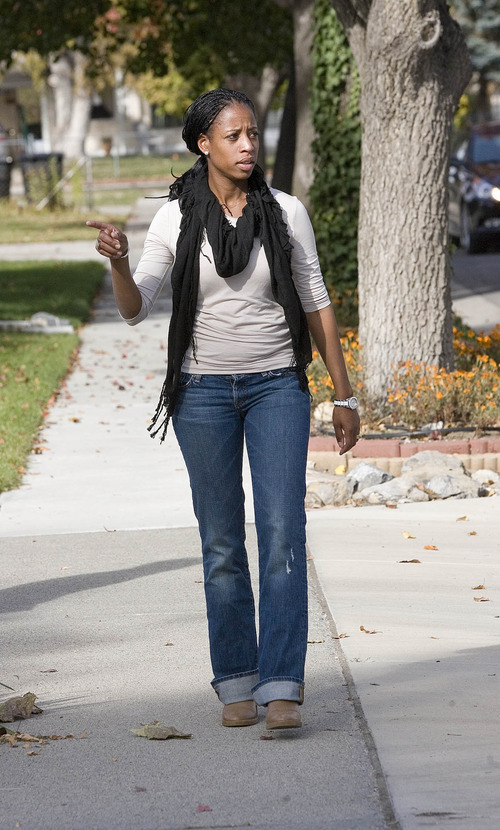 Paul Fraughton | The Salt Lake Tribune
Mia Love walks through a Murray neighborhood in the waning days of the election for Utah's 4th Congressional District. She says she tries to get out in the community knocking on doors twice a day.