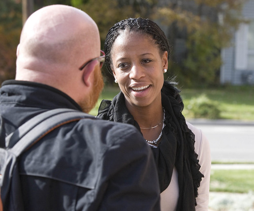 Paul Fraughton | The Salt Lake Tribune
Congressional candidate Mia Love chats with Josh Jackson as she goes door to door in a Murray neighborhood on Tuesday, Oct. 30, 2012.