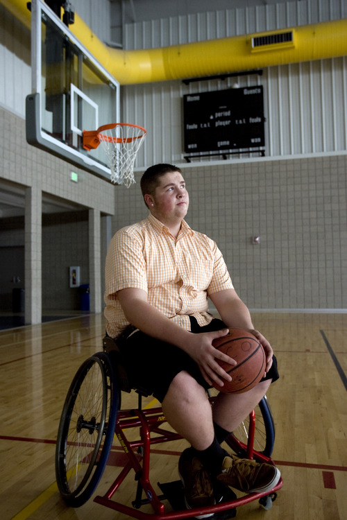 Kim Raff | The Salt Lake Tribune
Marcus Bockman has a degenerative desease that is keeping him from playing high school basketball.  He has taken up wheelchair basketball in it's place and plays at Copperview Recreation Center where he poses for a portrait in Midvale, Utah on October 29, 2012.