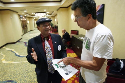 Francisco Kjolseth  |  The Salt Lake Tribune
Shree Sharma, left, of Salt Lake City speaks with Joe Andrade, independent candidate for the 2nd Congressional District as Andrade protests his exclusion from a debate with the Republican and Democratic candidates.