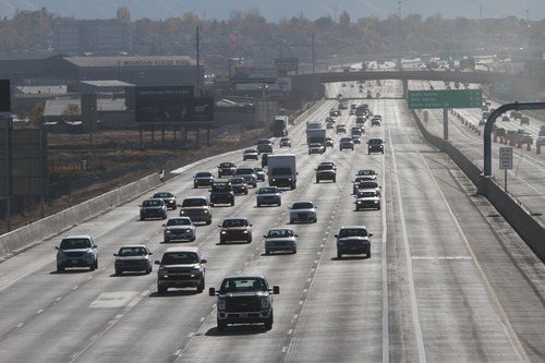 Rick Egan  | The Salt Lake Tribune 
The nearly three year, $1 billion-plus project to rebuild I-15 through Utah County is all but completed and all lanes will be open in time for Monday morning's commute. The Utah Department of Transportation announced the early opening Friday -- prompting some to question the timing so close to the election.