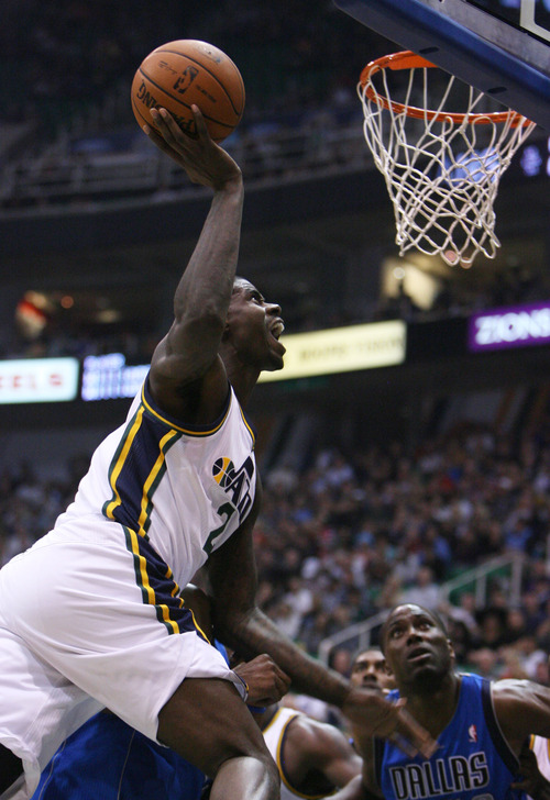 Steve Griffin | The Salt Lake Tribune


Utah's Marvin Williams throws the ball at the rim as he gets fouled in the lane during first-half action in the season opener against the Dallas Mavericks at EnergySolutions Arena  in Salt Lake City on Wednesday, Oct. 31, 2012.