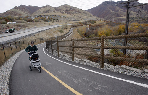 Rick Egan  | The Salt Lake Tribune 
Michael Wisenant runs along Parleys Trail, Thursday, November 1, 2012. Some of the proceeds from a $47 million parks and trails bond that will be on the Nov. 6 ballot in Salt Lake County will be used to connect existing segments of the trail.