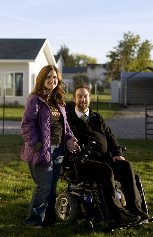 Kim Raff  |  The Salt Lake Tribune
Newlyweds Rich and Amy McKenzie outside their home in Plain City, Utah, on October 28, 2012. Rich McKenzie was with his four friends on a trip at the San Rafael Swell in celebration of their high school graduation when he dove into a river with a hidden sandbar just below the surface. He became instantly paralyzed. Fourteen years later, the five have stayed friends, all getting married and starting families except for Rich -- until now. He met Amy Terry last year and they were married last month.