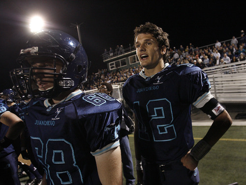 Scott Sommerdorf  |  The Salt Lake Tribune              
Juan Diego QB Nick Markosian, #12, was one of the Soaring Eagles' offensive stars, here on the sidelines after he was lifted from the game late in the second half. Juan Diego beat Hurricane 38-0 in a 3A state quarterfinal playoff game, Friday, November 2, 2012.