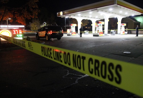 Rick Egan  |  The Salt Lake Tribune 
Yellow tape surrounds the Shell gas station on 500 East and 2100 South in Salt Lake City, where two shooting victims pulled in to get help on Sunday.