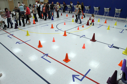 Rick Egan  | The Salt Lake Tribune 

Although the lines were short around lunchtime, arrows on the floor indicate the high voter turnout early this morning at Pony Express Elementary School in Eagle Mountain, Tuesday, November 6, 2012.