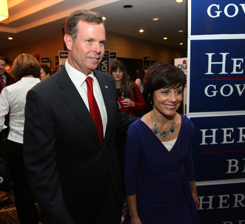 Steve Griffin | The Salt Lake Tribune
Chief Deputy Attorney General, John Swallow walks with his wife, Suzanne, during election night party for the Republicans at the Hilton Hotel in Salt Lake City, Utah Tuesday November 6, 2012.