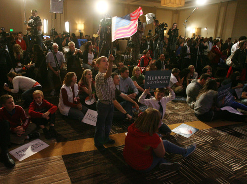 Steve Griffin | The Salt Lake Tribune


A child waves a flag as Utah governor Gary Herbert takes the stage for his victory speech during election night party for the Republicans at the Hilton Hotel in Salt Lake City, Utah Tuesday November 6, 2012.