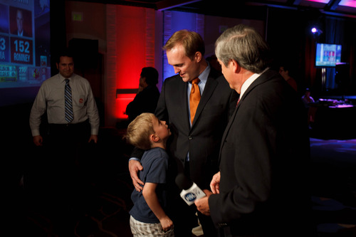 Trent Nelson  |  The Salt Lake Tribune
Salt Lake County mayoral candidate Ben McAdams with his son James at the Salt Lake Sheraton Hotel, Democratic headquarters on election night Tuesday, Nov. 6, 2012, in Salt Lake City.