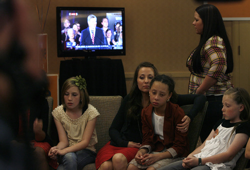 Scott Sommerdorf  |  The Salt Lake Tribune              
Waiting for Mia Love to give her concession speech at the GOP headquarters, her daughter Abigale, 9, center in the red shirt is consoled by supporters on election night.