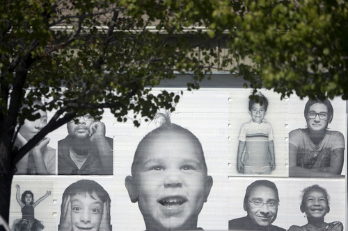 Kim Raff | The Salt Lake Tribune
Inside Out Project exhibit's portraits of people in the Neighborhood House community as part of the Urban Art Gallery on its property in Salt Lake City.