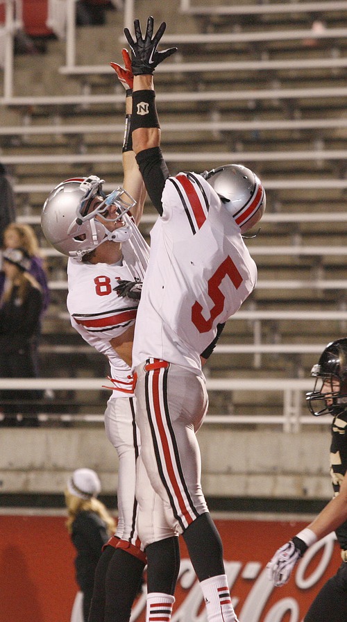 Paul Fraughton | Salt Lake Tribune
Spanish Fork's Colton Olson  celebrates with Cameron Money  after Money's touchdown in the opening minutes of the second half.Desert Hills High School played Spanish Fork at Rice Eccles Stadium in a State 3A semi-final game.
 Thursday, November 8, 2012