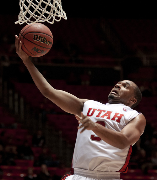Michael Mangum  |  Special to the Tribune

Utah guard Justin Seymour (3) goes up for a layup during their game against the Willamette Bearcats at the Huntsman Center on Friday, November 9, 2012. Seymour finished with 6 rebounds and 16 points as the Utes beat the Bearcats 104-47.