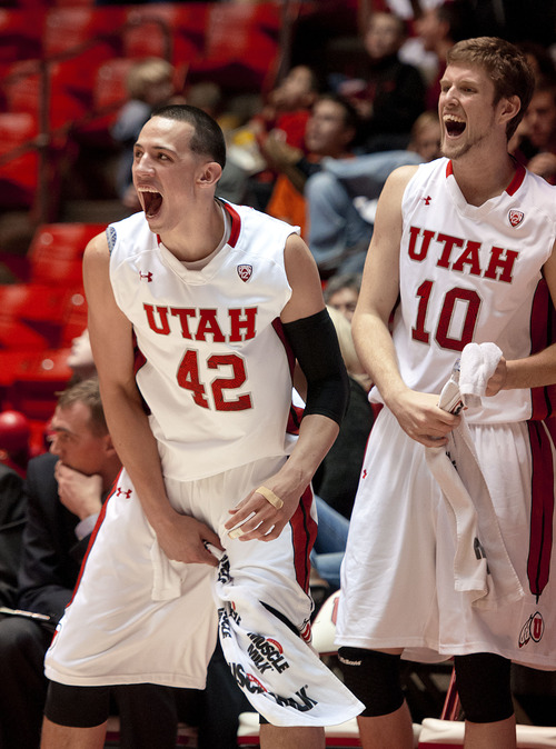 Michael Mangum  |  Special to the Tribune

Utah center Jason Washburn (42) and forward Renan Lenz (10) celebrate as the Utes take a 50-point lead over the Willamette Bearcats during their game at the Huntsman Center on Friday, November 9, 2012. The Utes beat the Bearcats 104-47.