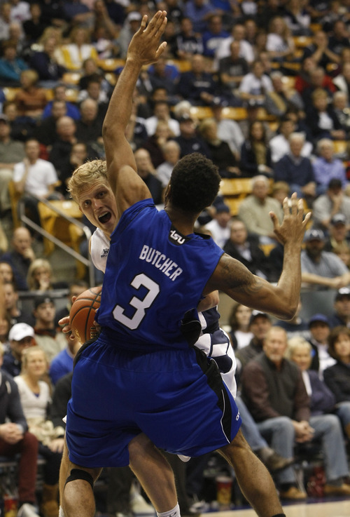 Chris Detrick  |  The Salt Lake Tribune
Brigham Young Cougars guard Tyler Haws (3) is guarded by Tennessee State Tigers guard Kharon Butcher (3) during the second half of the game at the  Marriott Center Friday November 9, 2012.  BYU won the game 81-66.