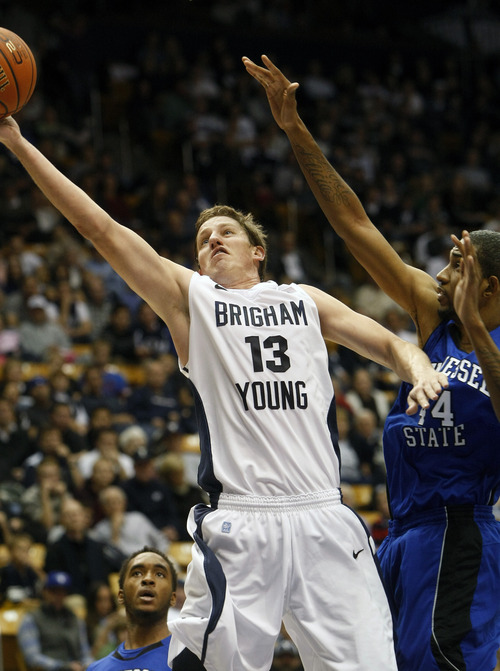 Chris Detrick  |  The Salt Lake Tribune
Brigham Young Cougars guard Brock Zylstra (13) shoots past Tennessee State Tigers forward Michael Green (44) during the second half of the game at the  Marriott Center Friday November 9, 2012.  BYU won the game 81-66.