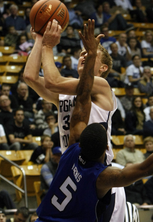 Chris Detrick  |  The Salt Lake Tribune
Brigham Young Cougars guard Tyler Haws (3) is guarded by Tennessee State Tigers guard Jay Harris (5) during the second half of the game at the  Marriott Center Friday November 9, 2012.  BYU won the game 81-66.