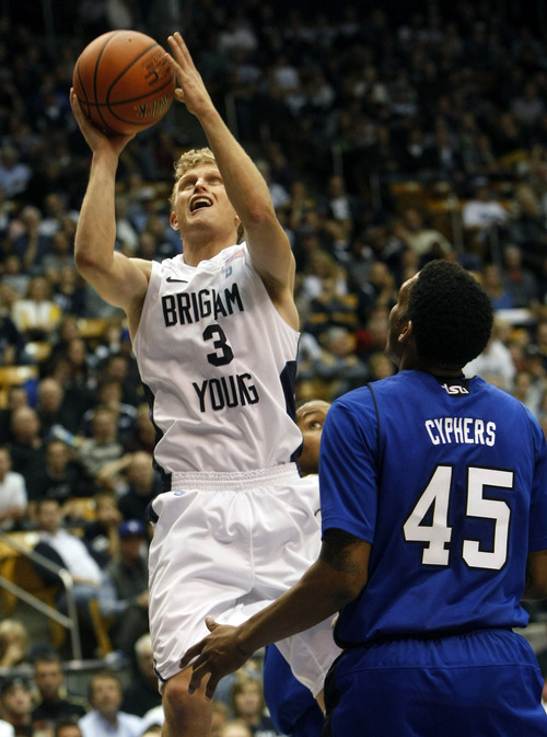 Chris Detrick  |  The Salt Lake Tribune
Brigham Young Cougars guard Tyler Haws (3) shoots past Tennessee State Tigers guard Jordan Cyphers (45) during the second half of the game at the  Marriott Center Friday November 9, 2012.  BYU won the game 81-66.
