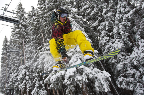 Chris Detrick  |  The Salt Lake Tribune
Snowboarder Baxter Spanbauer, 13, of Lehi, flies through the air off of a jump at Brighton Saturday November 10, 2012.