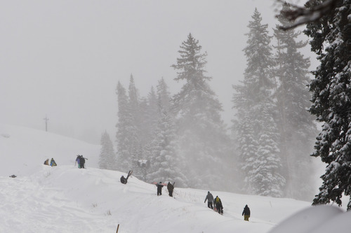 Chris Detrick  |  The Salt Lake Tribune
Skiers and snowboarders hike up the slope at Brighton Saturday November 10, 2012.