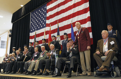 Al Hartmann  |  The Salt Lake Tribune
Eleven American service veterans are honored during a Veterans Day ceremony at the University of Utah Friday. These 11 veterans from various wars were chosen for their exemplary service and awarded honorary medals.