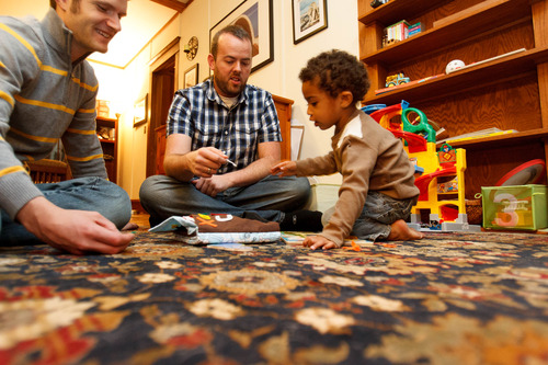 Trent Nelson  |  The Salt Lake Tribune
Brandon Mark, left, and Weston Clark play with their 2-year-old son, Xander Clark, in their home Friday, November 9, 2012 in Salt Lake City.