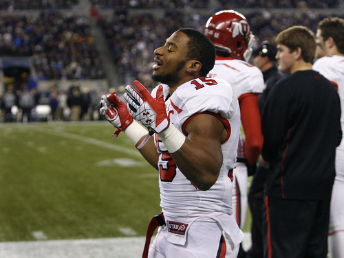 Scott Sommerdorf  |  The Salt Lake Tribune              
Utah RB John White reacts to the taunting by Huskie fans after he came to the bench following his 46 yard TD run to give the Utes an early 8-0 lead. Utah trailed Washington 14-8 at the half at Century Link Field in Seattle, Saturday, November 10, 2012.