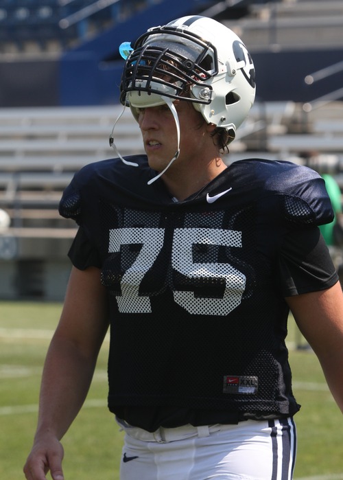 Rick Egan  | The Salt Lake Tribune 

Offensive lineman, Braden Brown (75) at the scrimmage at LaVell Edwards StadiumThursday, August 9, 2012.
