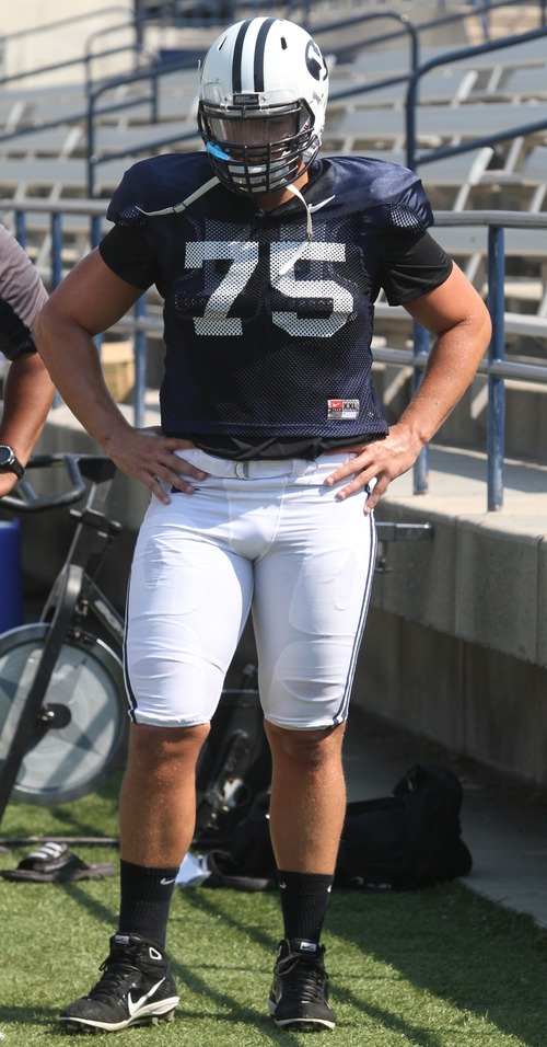 Rick Egan  | The Salt Lake Tribune 

Offensive lineman, Braden Brown (75) at the scrimmage at LaVell Edwards StadiumThursday, August 9, 2012.