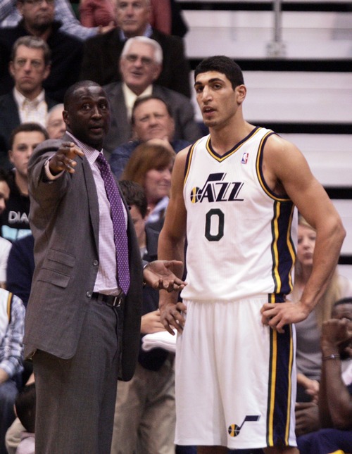 Kim Raff  |  The Salt Lake Tribune
Jazz head coach Tyrone Corbin talks with Utah Jazz center Enes Kanter (0) on the sidelines during the second half against the Phoenix Suns at EnergySolutions Arena in Salt Lake City, Utah on November 10, 2012. The Jazz went on to win the game 94-81.