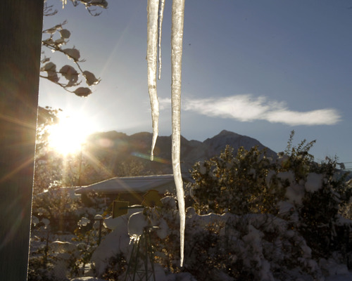 Al Hartmann  |  The Salt Lake Tribune
The sun peeks over the Wasatch Mountains on Monday, Nov. 12 for the first time in three days after this weekend's snowstorm.