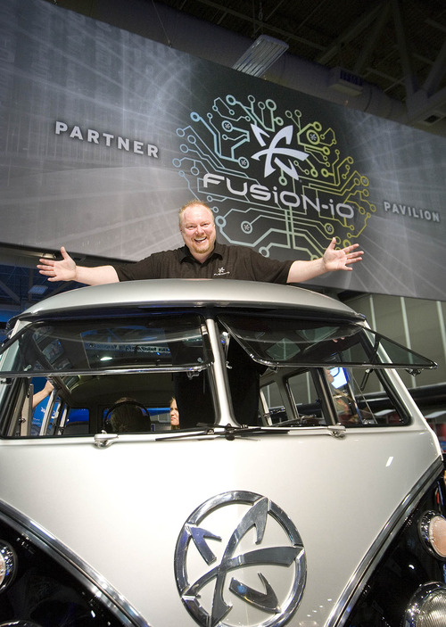 Paul Fraughton  | The Salt Lake Tribune
Rick White of Fusion-io stands in the company's 1962 VW minibus Safari Edition with the company logo on the front panel. The van is part of Fusion-io's elaborate booth at SC12, a  supercomputing convention at the Salt Palace Convention Center.
 Tuesday, November 13, 2012