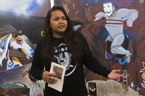 Chris Detrick  |  The Salt Lake Tribune
Granger High School senior Kierra Susuico talks about the sections she painted during the unveiling of Granger High School's student mural  "Sacred Images" at the Granite Education Center Programs Building Tuesday November 13, 2012.