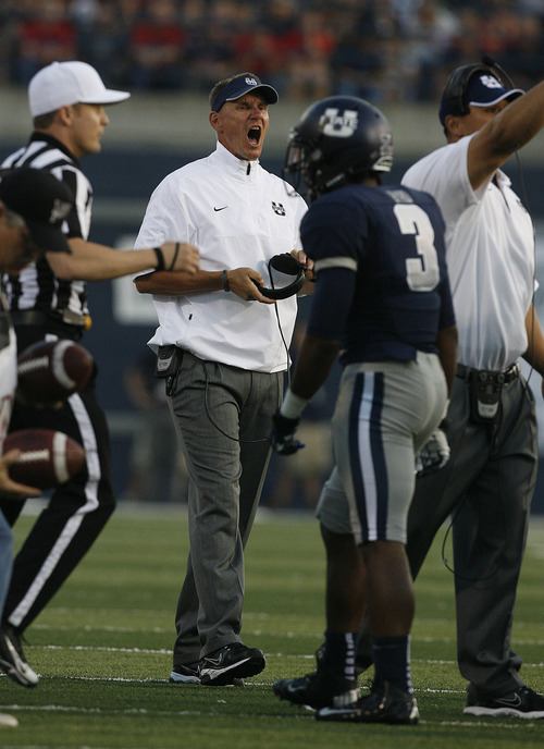 Scott Sommerdorf  |  The Salt Lake Tribune             
USU head coach Gary Anderson yells as he ortganizes his team during a time out late in the first half. The USU Aggies held a 13-3 lead over Utah at the half, Friday, September 7, 2012.