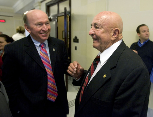 Tribune file photo
Retired state Sen. Mike Dmitrich, right, chats outside the state Senate chambers. Dmitrich represented Utah's coal country for 40 years. He blames redistricting for a shrinking Democratic popularity in the area but also says national party positions have hurt local minority-party candidates.