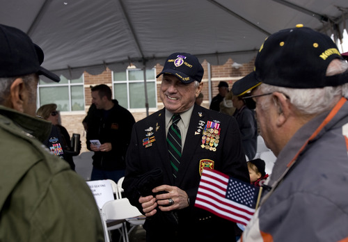 Kim Raff  |  The Salt Lake Tribune
Vietnam vet Patrick Watkins is a grand marshal of Taylorsville's Veterans Day Parade Sunday. The theme for this year's parade is "Welcome Home, Korean and Vietnam Veterans."