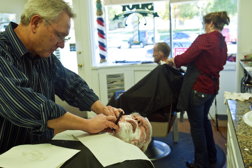 Chris Detrick  |  The Salt Lake Tribune
Bob Cantonwine cuts Peter Wimbrow's hair at Lee's Barber Shop in Bountiful.