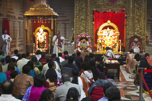 Chris Detrick  |  The Salt Lake Tribune
Priest Satish Kumar leads a worship service during the festival of Diwali at the Sri Ganesha Hindu Temple Tuesday November 13, 2012.