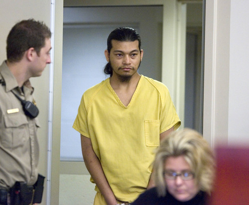 Paul Fraughton  |  The Salt Lake Tribune
Esar Met enters the courtroom during his preliminary hearing on Friday. Met is accused of killing 7-year-old Hser Ner Moo in 2008.