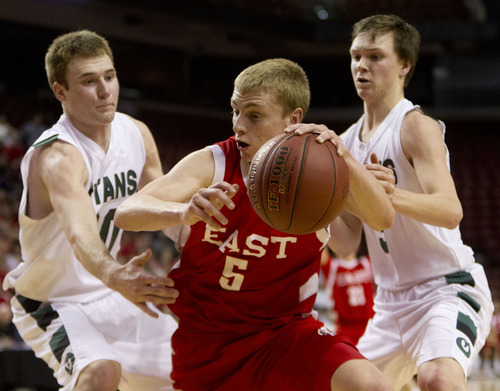 Trent Nelson  |  The Salt Lake Tribune
East's Parker Van Dyke is defended by Olympus' Will Cannon, left, and Coulson Hardy during the 4A High School Basketball Championships on Wednesday, Feb. 29, 2012, at the Maverik Center in West Valley City.