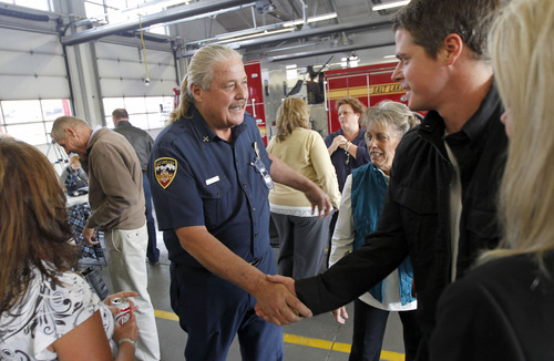 Al Hartmann  |  The Salt Lake Tribune
Friends and firefighters gathered at Salt Lake City Fire Department Station 1 to say goodbye and honor Battalion Chief Mike Andrew who is retiring after 39 years.  Firefighting is a family tradition with both of his brothers and father serving in the Salt Lake City Fire Department for a combined 108 years.