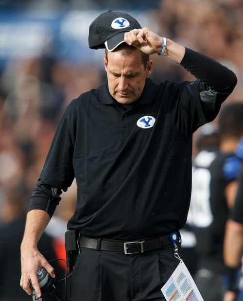 Trent Nelson  |  The Salt Lake Tribune
BYU offensive coordinator Brandon Doman reacts to the first of two critical pass interference calls as BYU hosts Oregon State on Oct. 13, 2012 in Provo.
