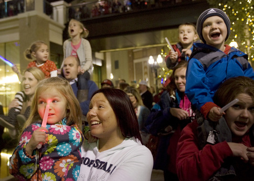 Kim Raff  |  The Salt Lake Tribune
Children react to Santa's arrival at the Regent Court at the City Creek Center in Salt Lake City on November 15, 2012.  Hundreds gathered in the courtyard of the mall as Santa made his grand entrance. Santa will be at the court through December 24.
