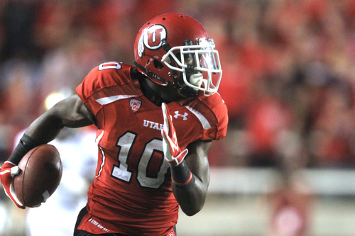 Rick Egan  | The Salt Lake Tribune 
 
Ute's wide receiver DeVonte Christopher (10) runs for a big gain after catching a pass, in Pac-12 action, Utah vs. University of Washington, at Rice-Eccles stadium, Saturday, October 1, 2011.