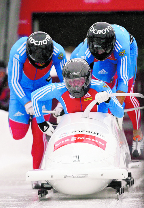 Kim Raff  |  The Salt Lake Tribune
Alexander Zubkov drives Russia 1 at the start of heat 1 of the FIBT Men's 4 Man Bobsled World Cup at Utah Olympic Park in Park City, Utah on November 17, 2012. The team went on to place first in the event.