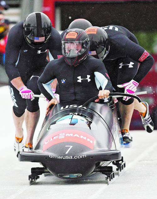 Kim Raff  |  The Salt Lake Tribune
Steven Holcomb drives USA 1 at the start of heat 1 of the FIBT Men's 4 Man Bobsled World Cup at Utah Olympic Park in Park City, Utah on November 17, 2012. The team went on to place second in the event.