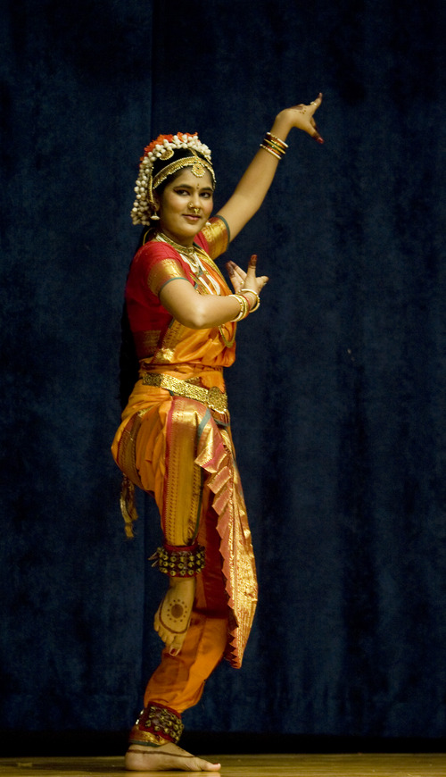 Kim Raff  |  The Salt Lake Tribune
Shreeya Mody performs a dance during the Diwali, the festival of lights, celebration of the Indian New Year at the Krishna Temple in Salt Lake City on November 18, 2012.