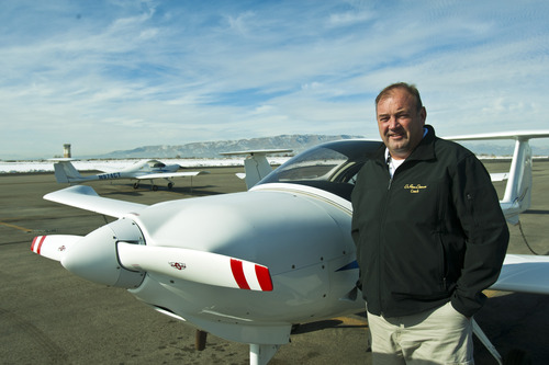 Chris Detrick  |  The Salt Lake Tribune
Dr. Peter Dittmer poses for a portrait with a DA-20 airplane at the Utah Valley University pilot training building at the Provo Airport Wednesday November 14, 2012.