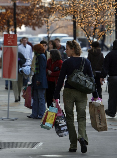 Francisco Kjolseth  |  The Salt Lake Tribune file photo
Early holiday shoppers take to the walkways of The Gateway. Salt Lake City police are advising shoppers not to leave valuables where they can be seen in their vehicles to prevent break-ins.